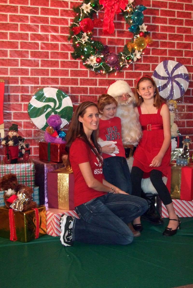 photo of family and Santa